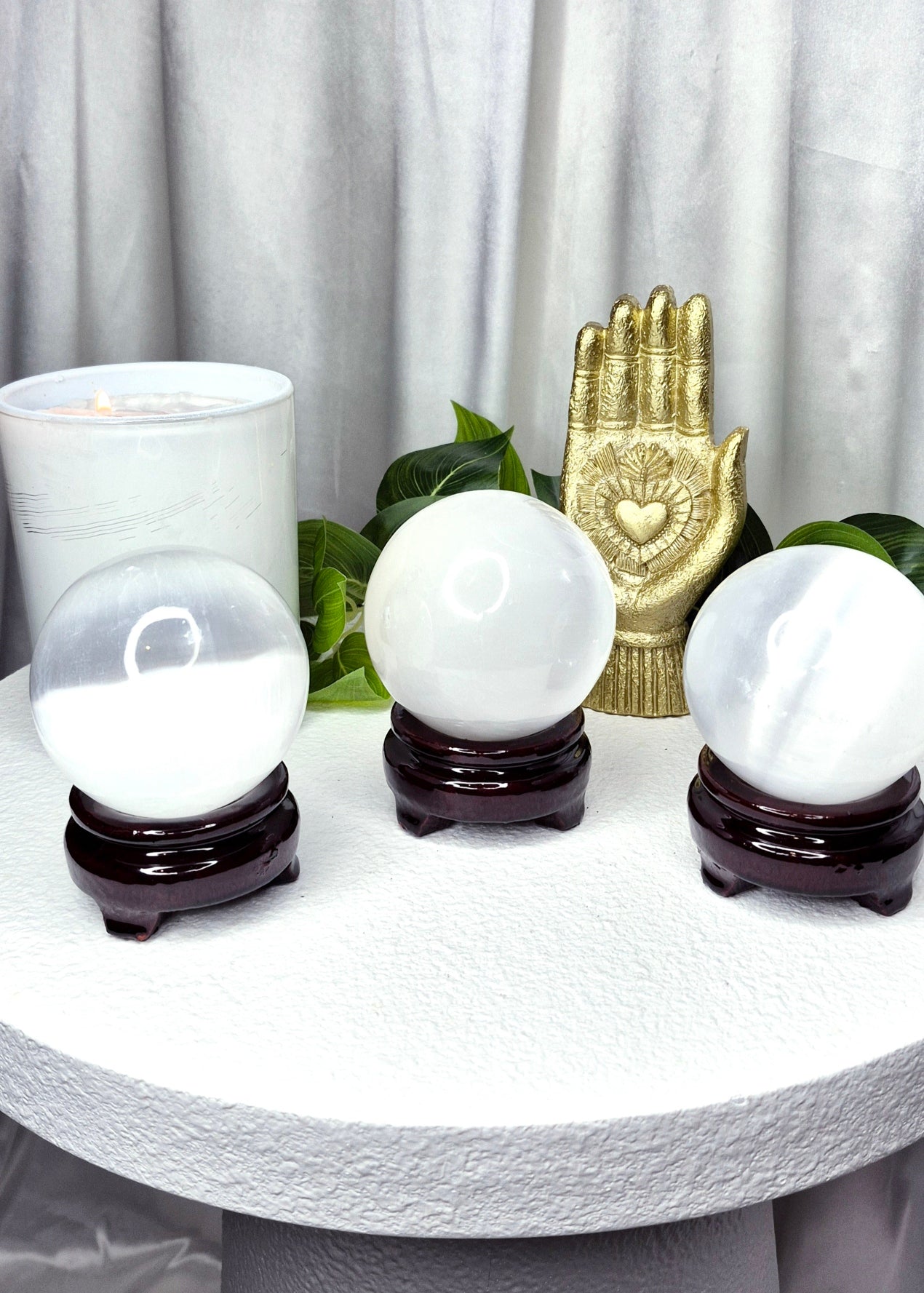 Selenite Sphere on wooden stand (Medium)