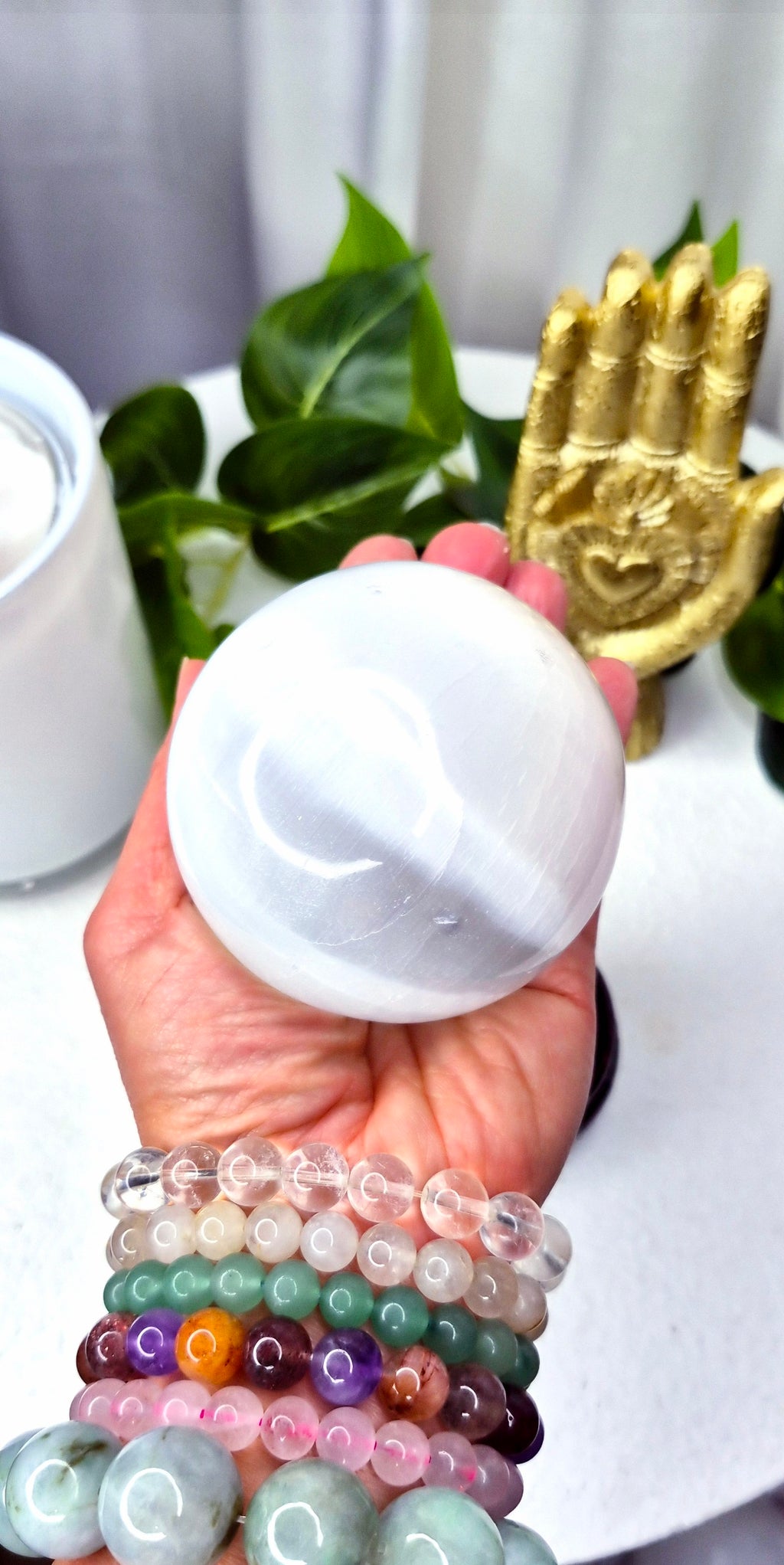 Selenite Sphere on wooden stand (Medium)