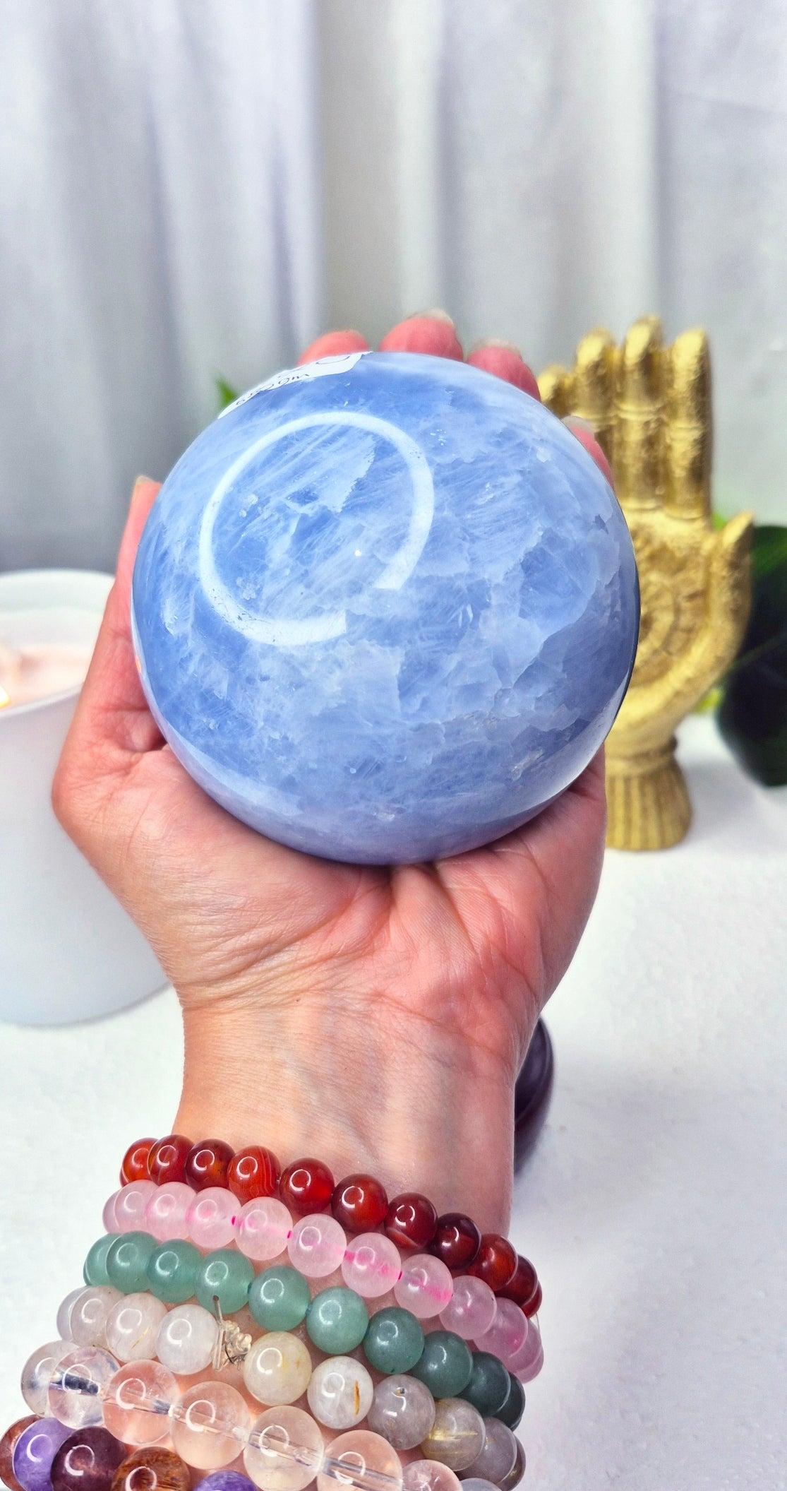 Blue Calcite Sphere on Wooden Stand