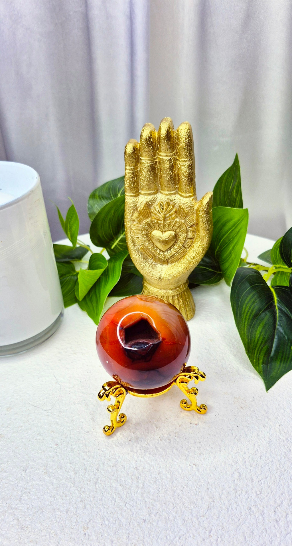 Carnelian Sphere with Druzy Cave on stand