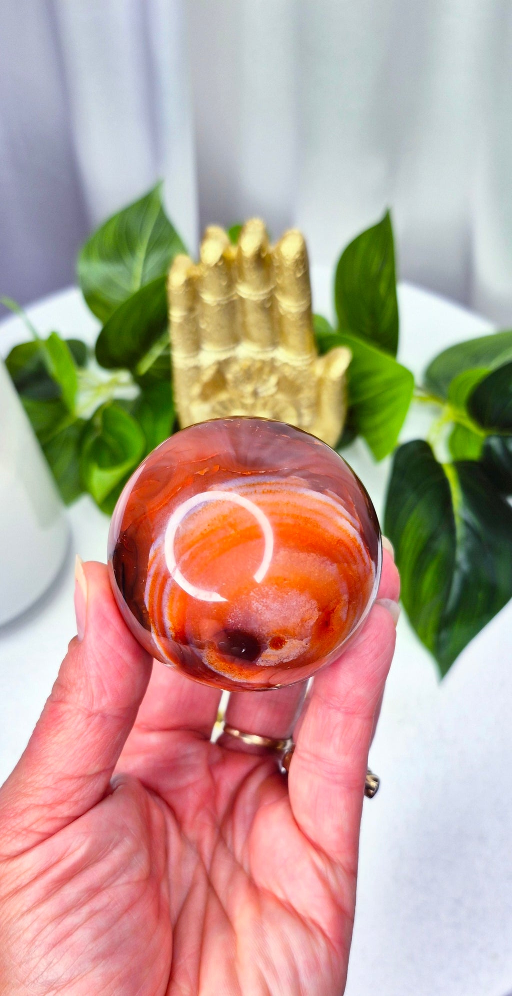 Carnelian Sphere with Druzy Cave on stand
