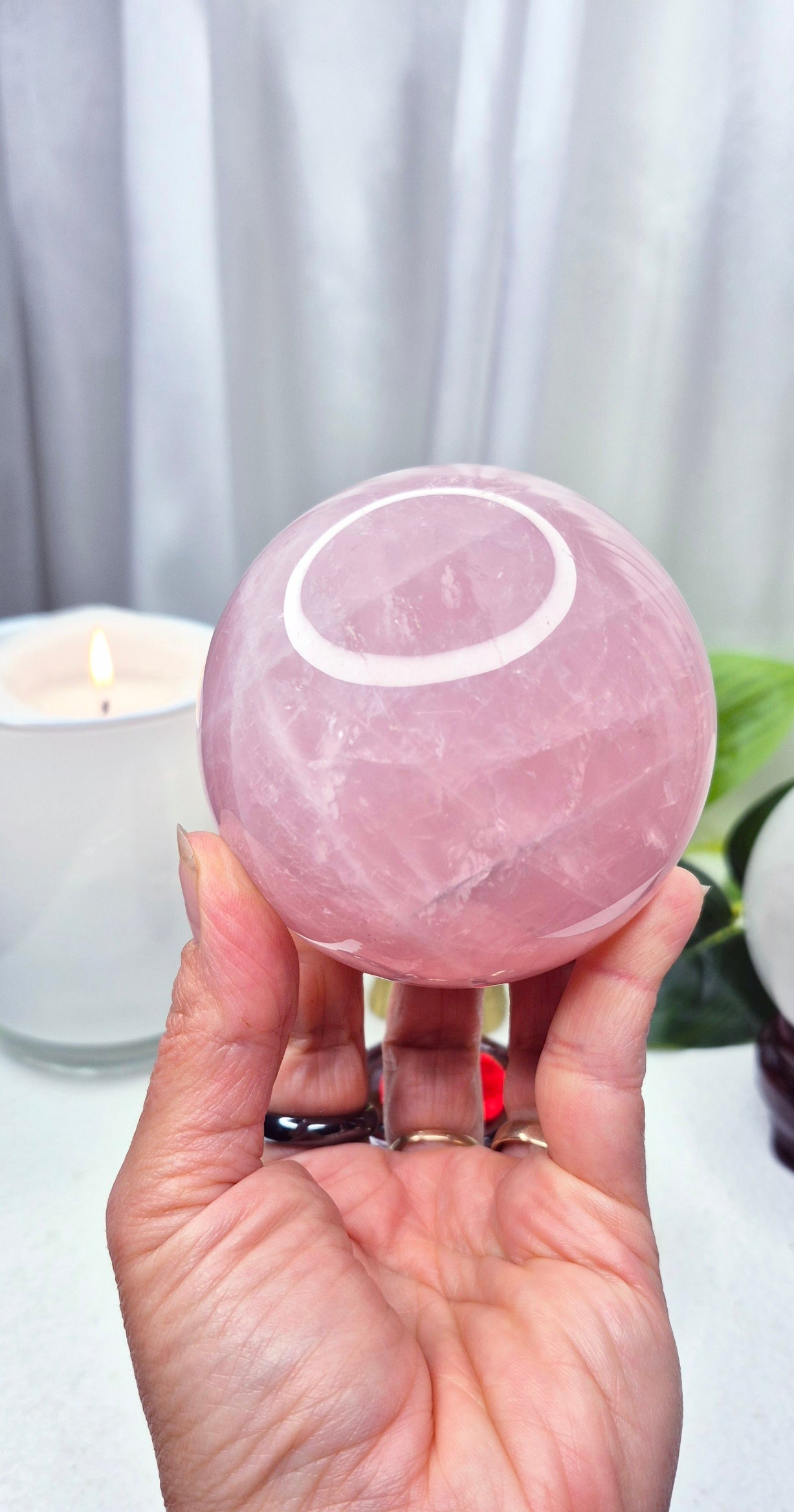 A Grade Rose Quartz Sphere on Wooden Stand
