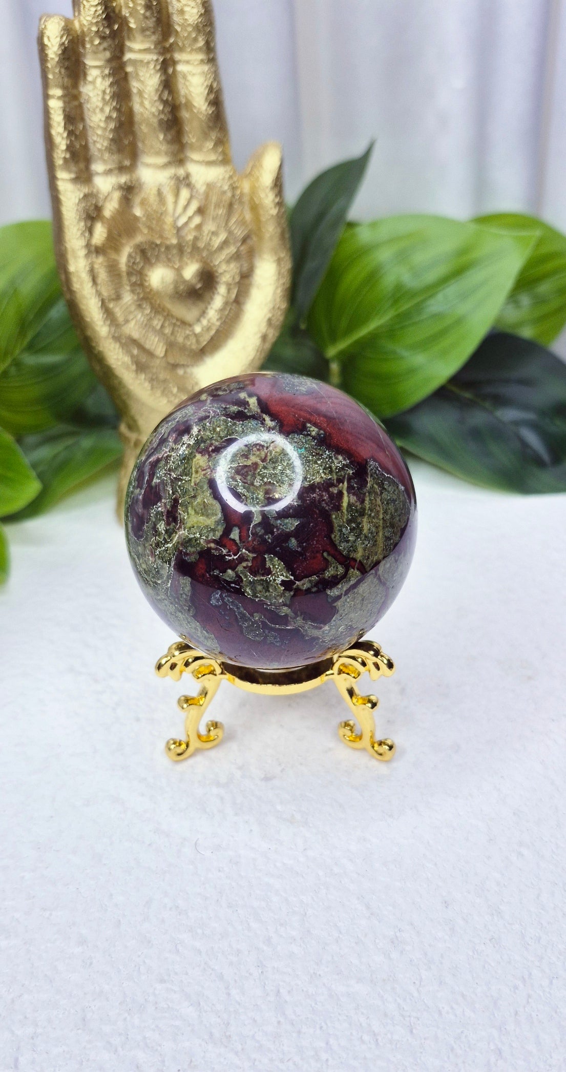 Dragon Bloodstone Sphere on stand