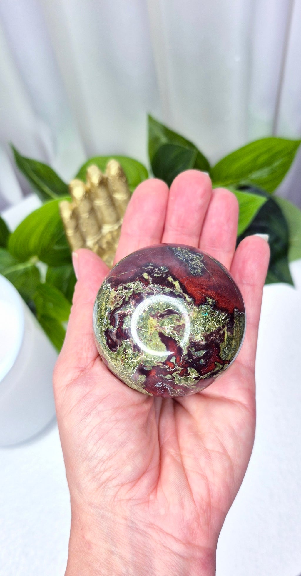 Dragon Bloodstone Sphere on stand