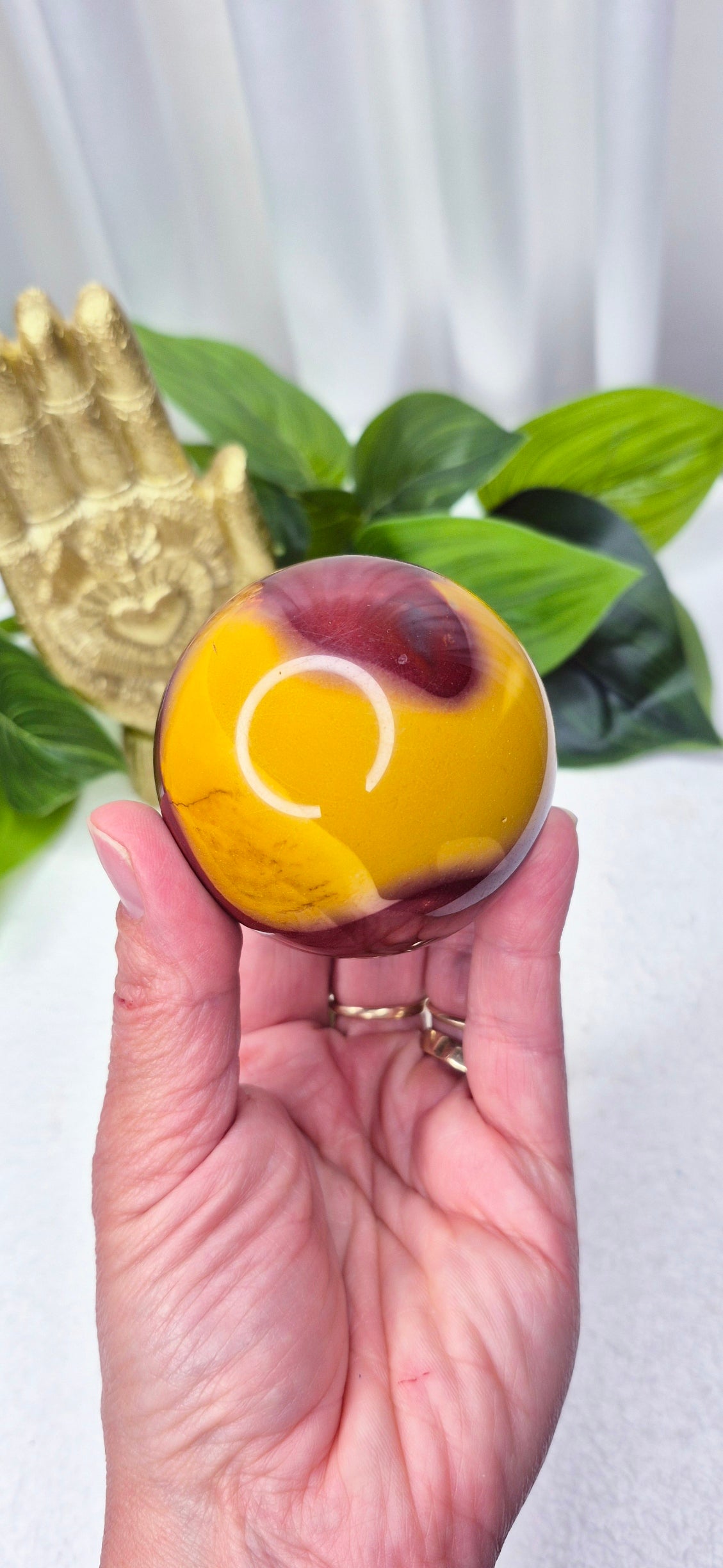 Mookaite sphere on Stand