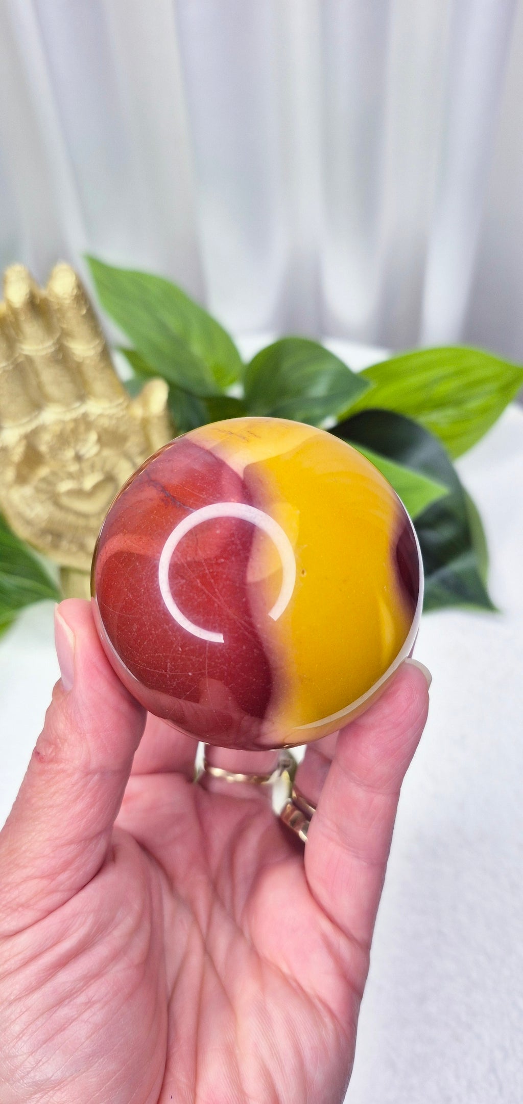 Mookaite sphere on Stand