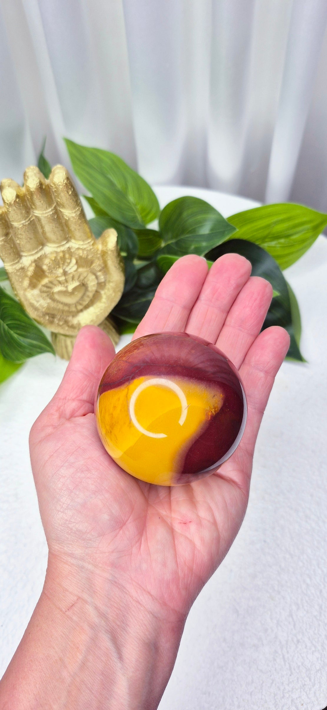Mookaite sphere on Stand